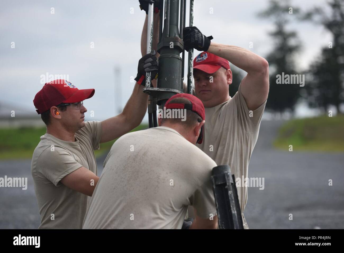 https://c8.alamy.com/comp/PR4JRN/airmen-with-the-201st-red-horse-squadron-fort-indiantown-gap-pennsylvania-anchor-an-aircraft-recovery-system-to-the-ground-to-ensure-the-safe-landing-of-an-aircraft-during-a-field-training-exercise-sept-7-2018-the-second-day-of-the-field-training-exercise-was-focused-on-specific-career-field-training-for-eight-different-air-force-specialty-codes-PR4JRN.jpg