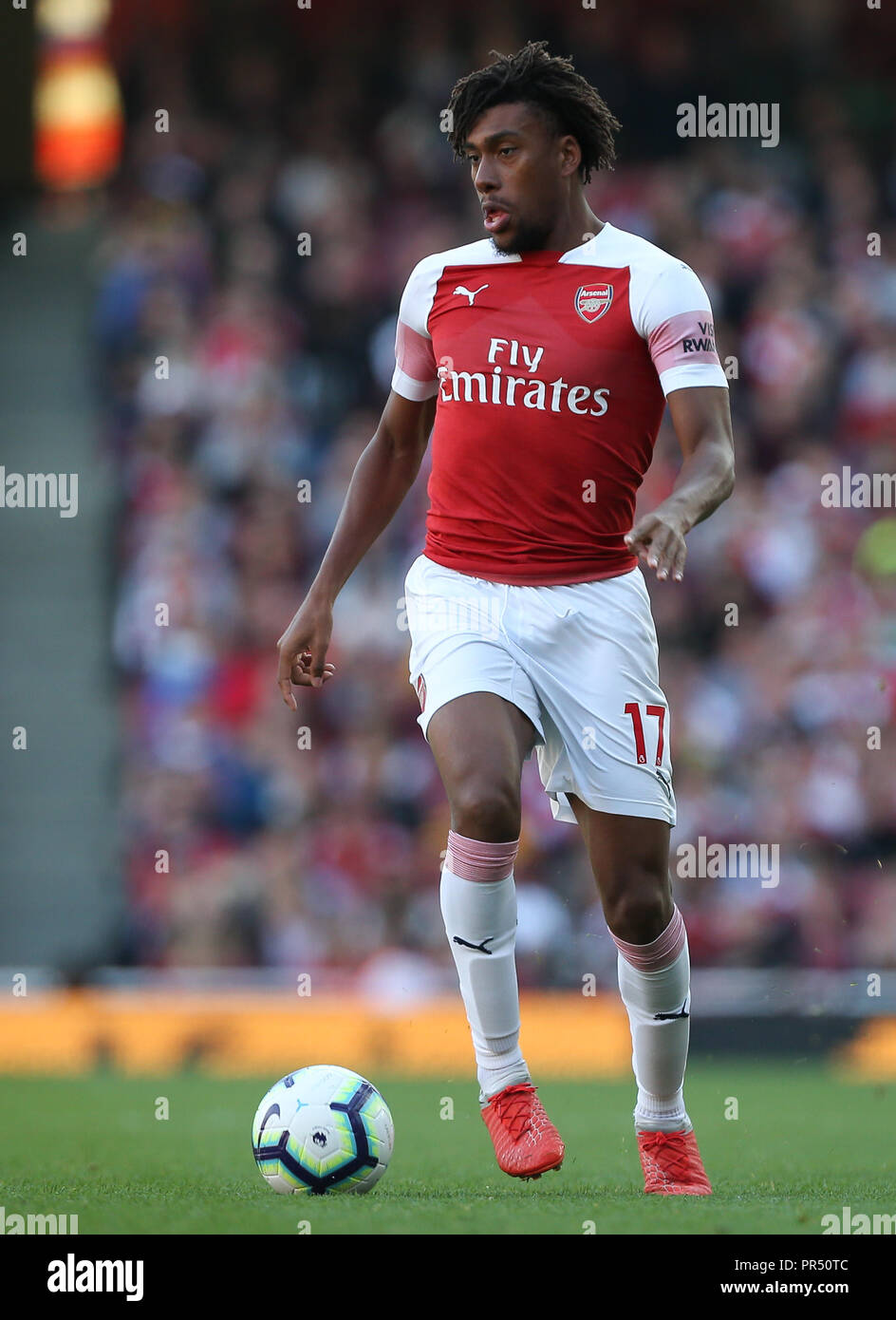 London, UK. 29th September 2018, Alex Iwobi of Arsenal on the ball during the Premier League match between Arsenal and Watford at Emirates Stadium on September 29th 2018 in London, England. Credit: PHC Images/Alamy Live News Stock Photo