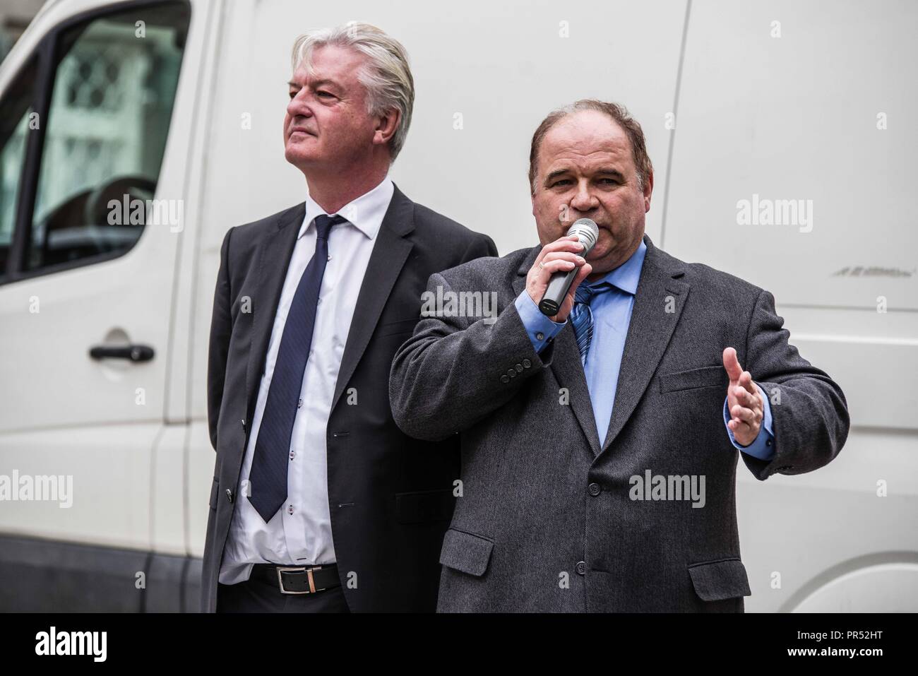 Garmisch Partenkirchen, Bavaria, Germany. 29th Sep, 2018. Juergen Elsaesser, Gernot Tegetmeyer outside of the Compact Konferenz. Adding themselves to the "who's who"" list of of several hundred right-extremists from Germany, Austria, Switzerland, and other countries, Tommy Robinson, founder of the British EDL, Lutz Bachmann, grounder of Germany's Pegida, and Martin Sellner of the Identitaere Bewegung were guests as the Compact Konferenz held in the international tourist town of Garmisch Partenkirchen in southern Bavaria. The conferences are held by Juergen Elsaesser, founder of C Stock Photo