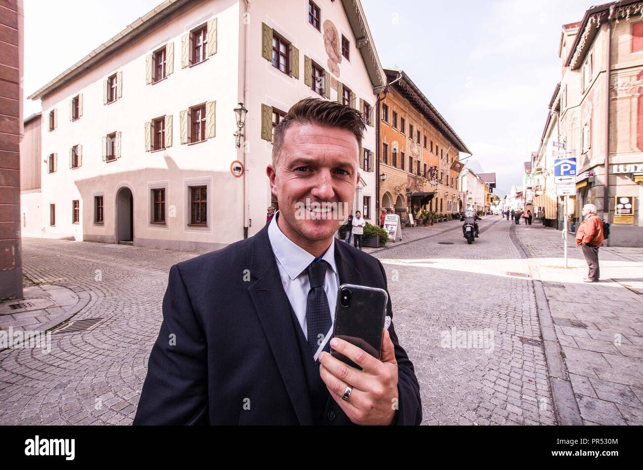Garmisch Partenkirchen, Bavaria, Germany. 29th Sep, 2018. Right-extremist and founder of the EDL TOMMY ROBINSON in Garmisch Partenkirchen, southern Bavaria. Adding themselves to the "who's who"" list of of several hundred right-extremists from Germany, Austria, Switzerland, and other countries, Tommy Robinson, founder of the British EDL, Lutz Bachmann, grounder of Germany's Pegida, and Martin Sellner of the Identitaere Bewegung were guests as the Compact Konferenz held in the international tourist town of Garmisch Partenkirchen in southern Bavaria. The conferences are held by Jue Stock Photo