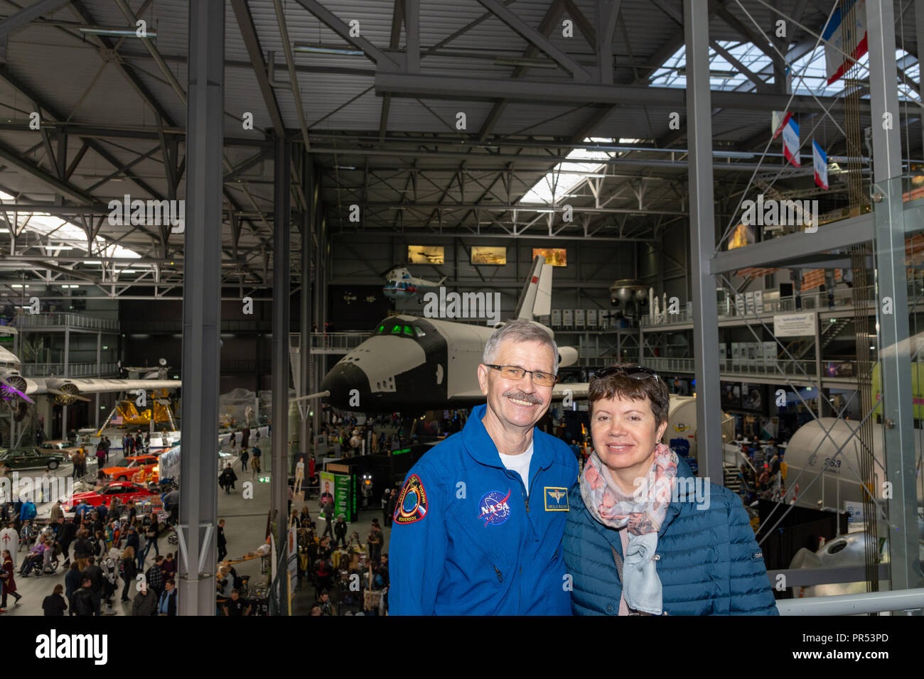 Speyer, Germany. 29th Sept 2018.  Cosmonaut Nikolai Budarin takes a tour of the exhibition during his visit at Technik Museum Speyer, Germany. With his wife (right) Credit: Markus Wissmann/Alamy Live News Stock Photo