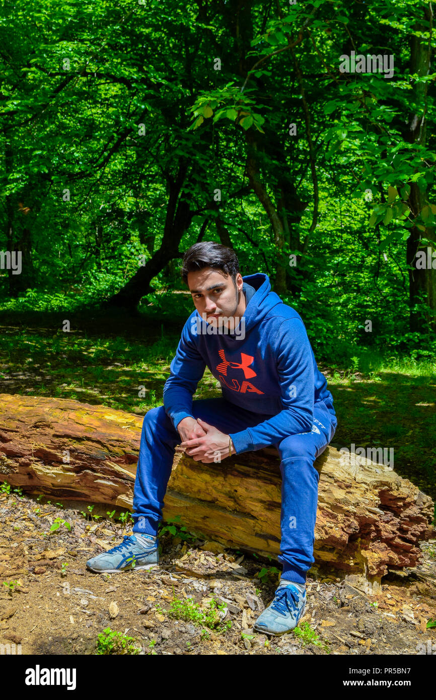 Young man in nature hi-res stock photography and images - Alamy