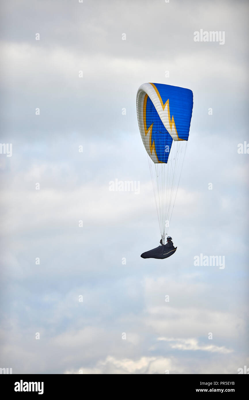 Paraglider flying above the westfacing escarpment slope on Dunstable