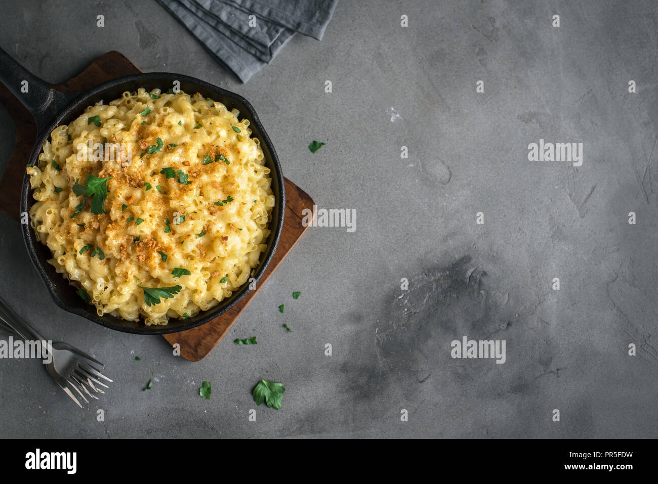 Mac and cheese, american style macaroni pasta with cheesy sauce and