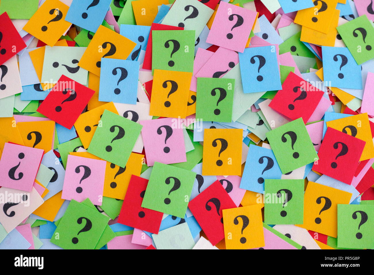 Too Many Questions. Big pile of colorful paper notes with question