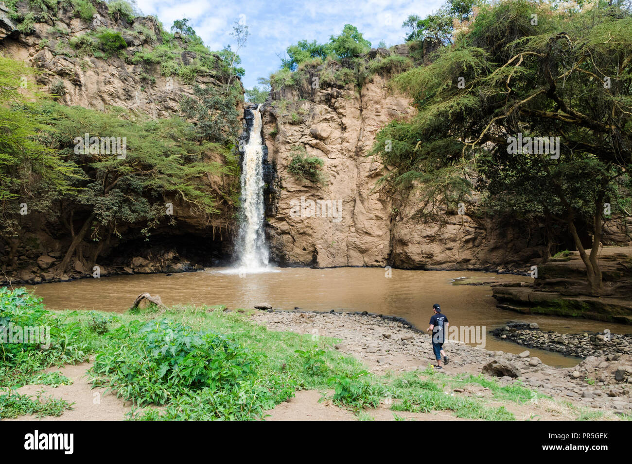 Tourist at Makalia waterfall, Lake Nakuru, Kenya Stock Photo