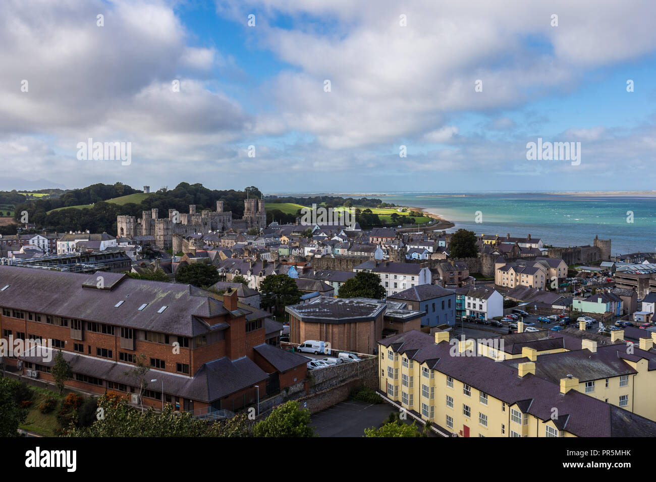 Caernarfon Castle and town, Gwynedd, North Wales, UK. View from Twthill