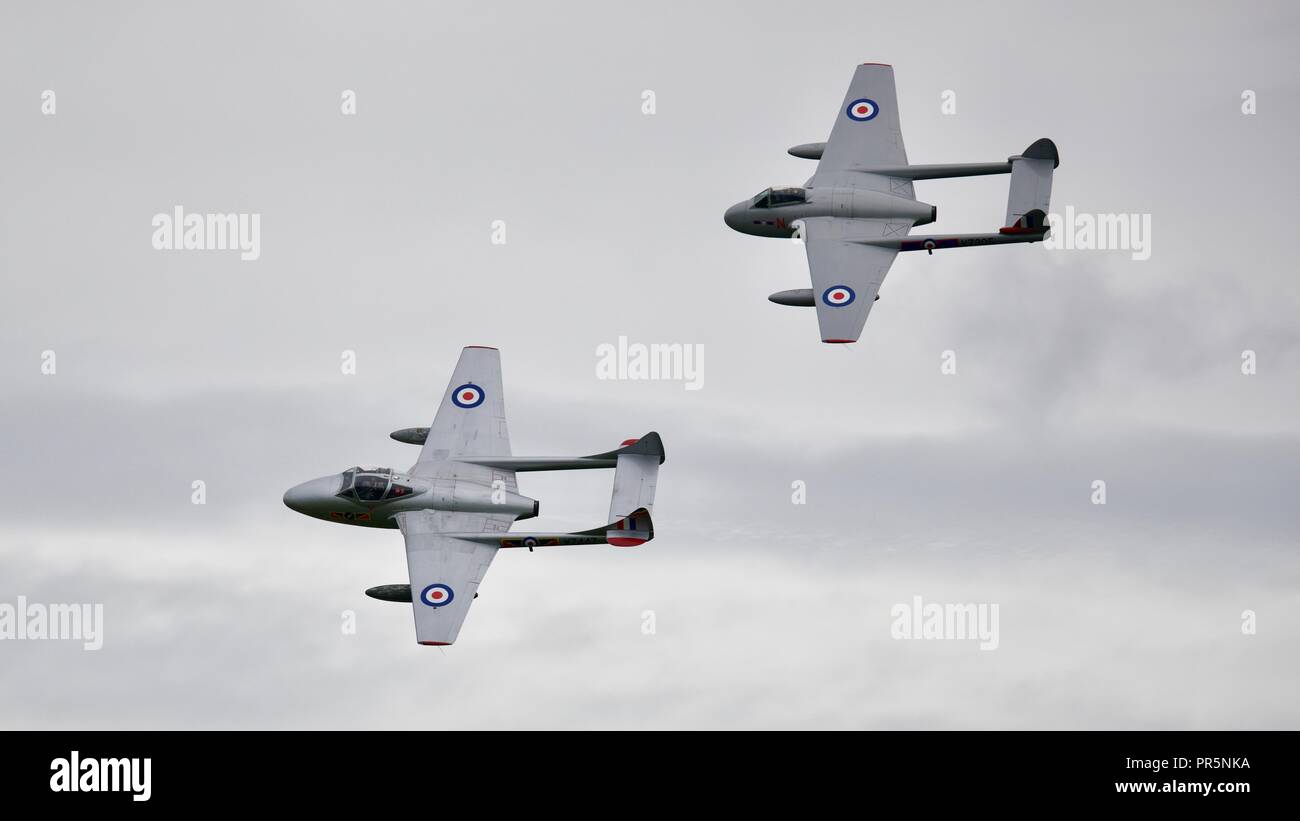 Two de Havilland Vampire jets operated by the Norwegian Air Force Historical Squadron flying at the Duxford Battle of Britain airshow on the 23/9/18 Stock Photo