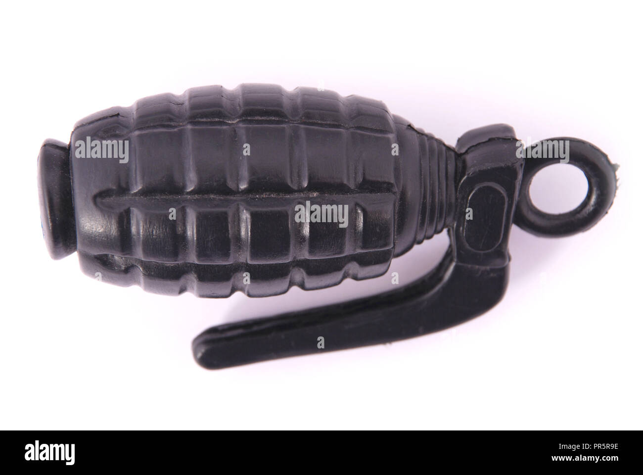 Black plastic toy grenade on a white background Stock Photo