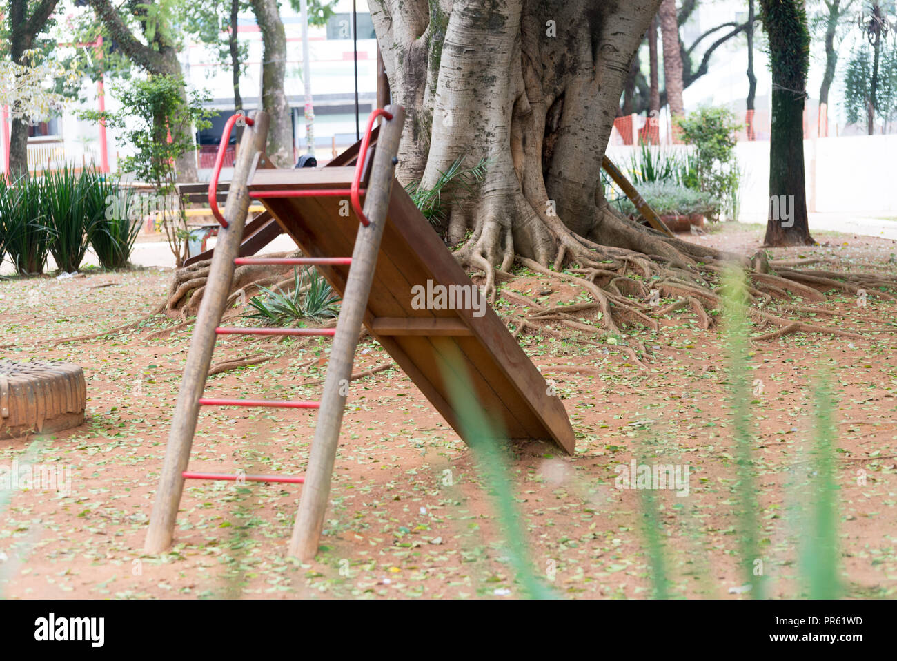 Public toys and exercise equipments at the park on sunny day Stock Photo