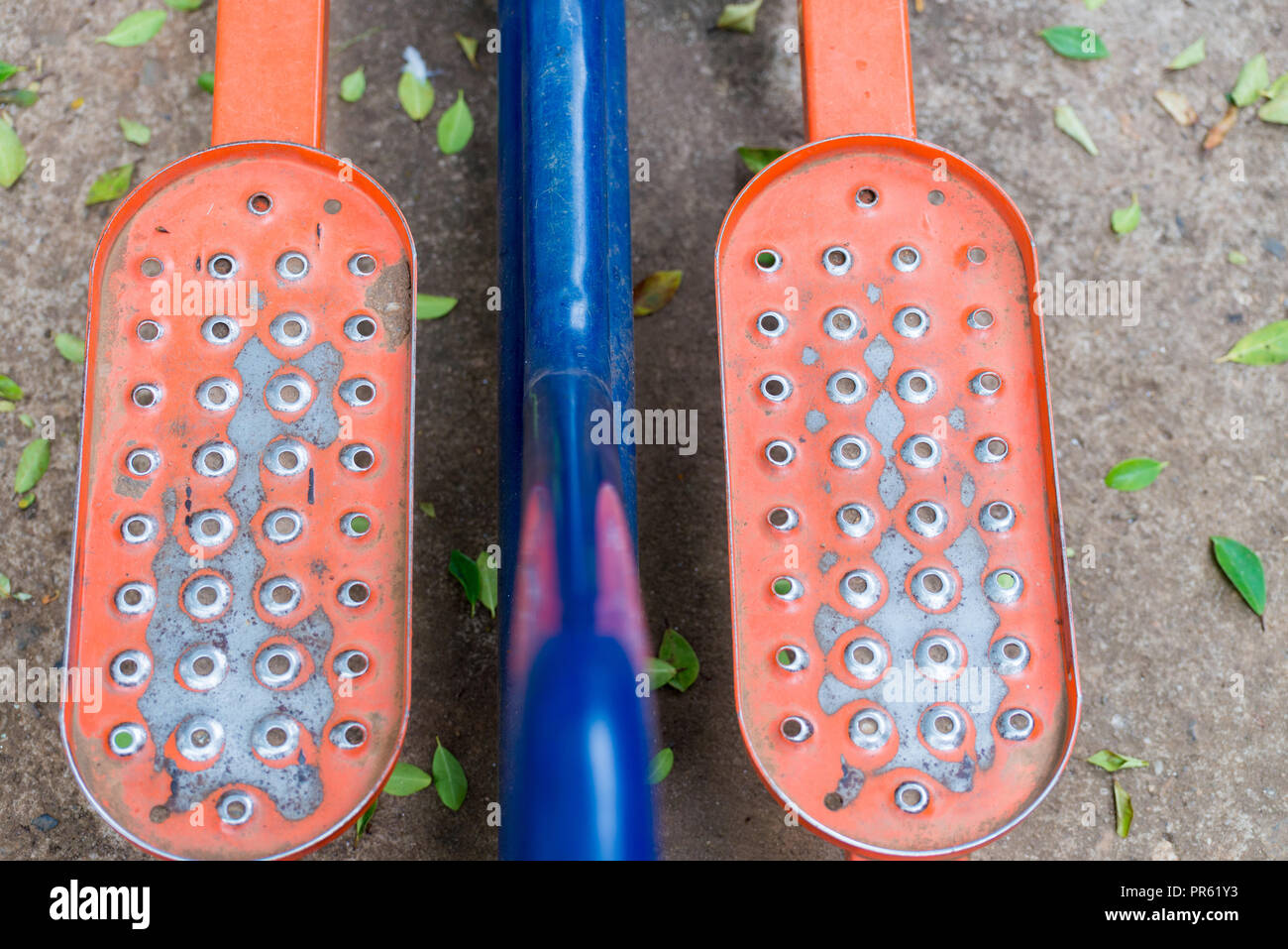 Public toys and exercise equipments at the park on sunny day Stock Photo
