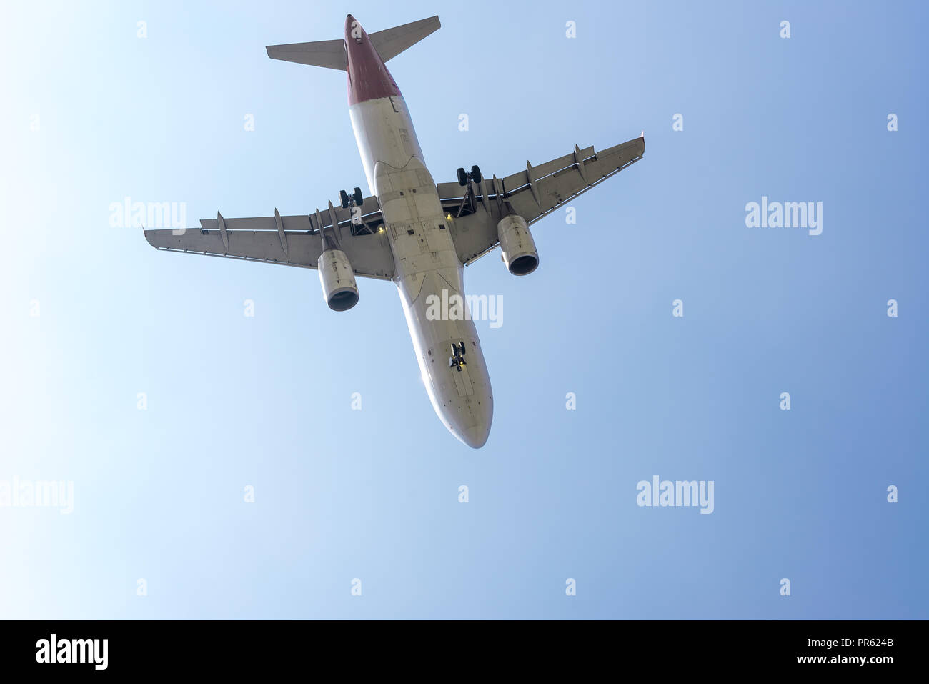 Close up view of an aircraft approaching the airport to land Stock Photo