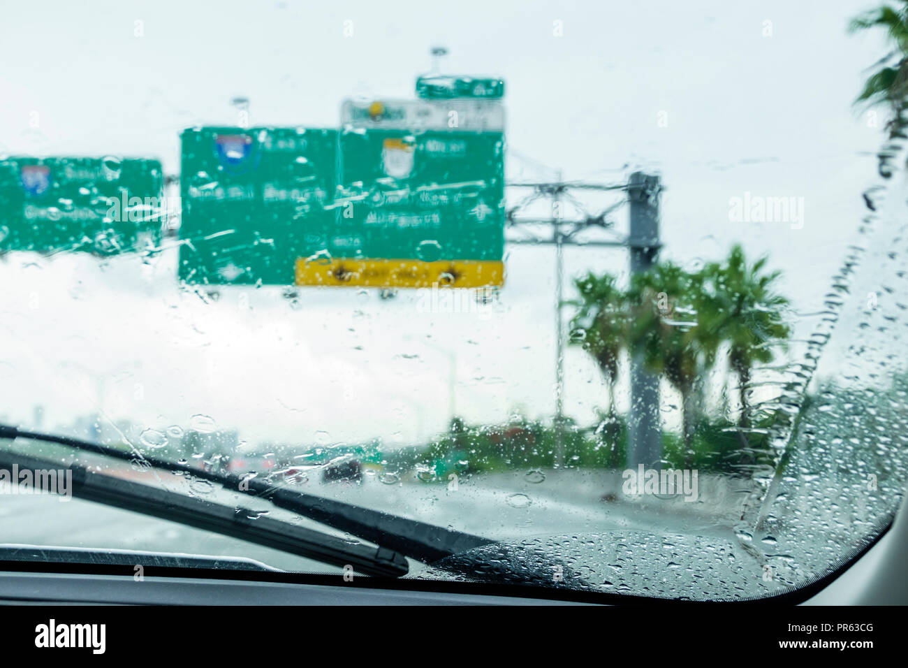 Miami Florida,Palmetto Expressway,driving,rain rainy raining,automobile car window windshield view,highway interstate,FL180630044 Stock Photo