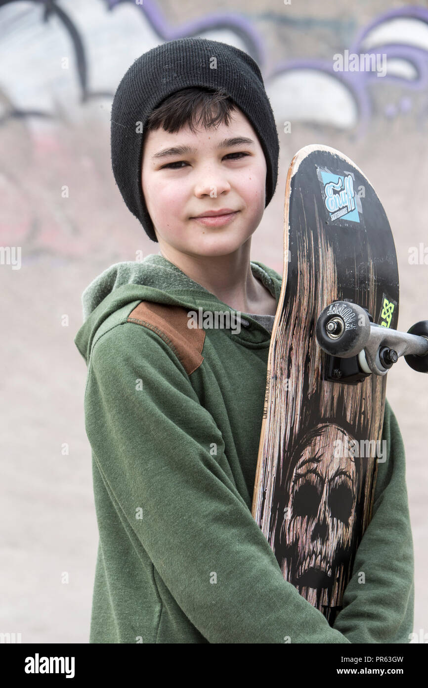 Young boy skateboarding Stock Photo