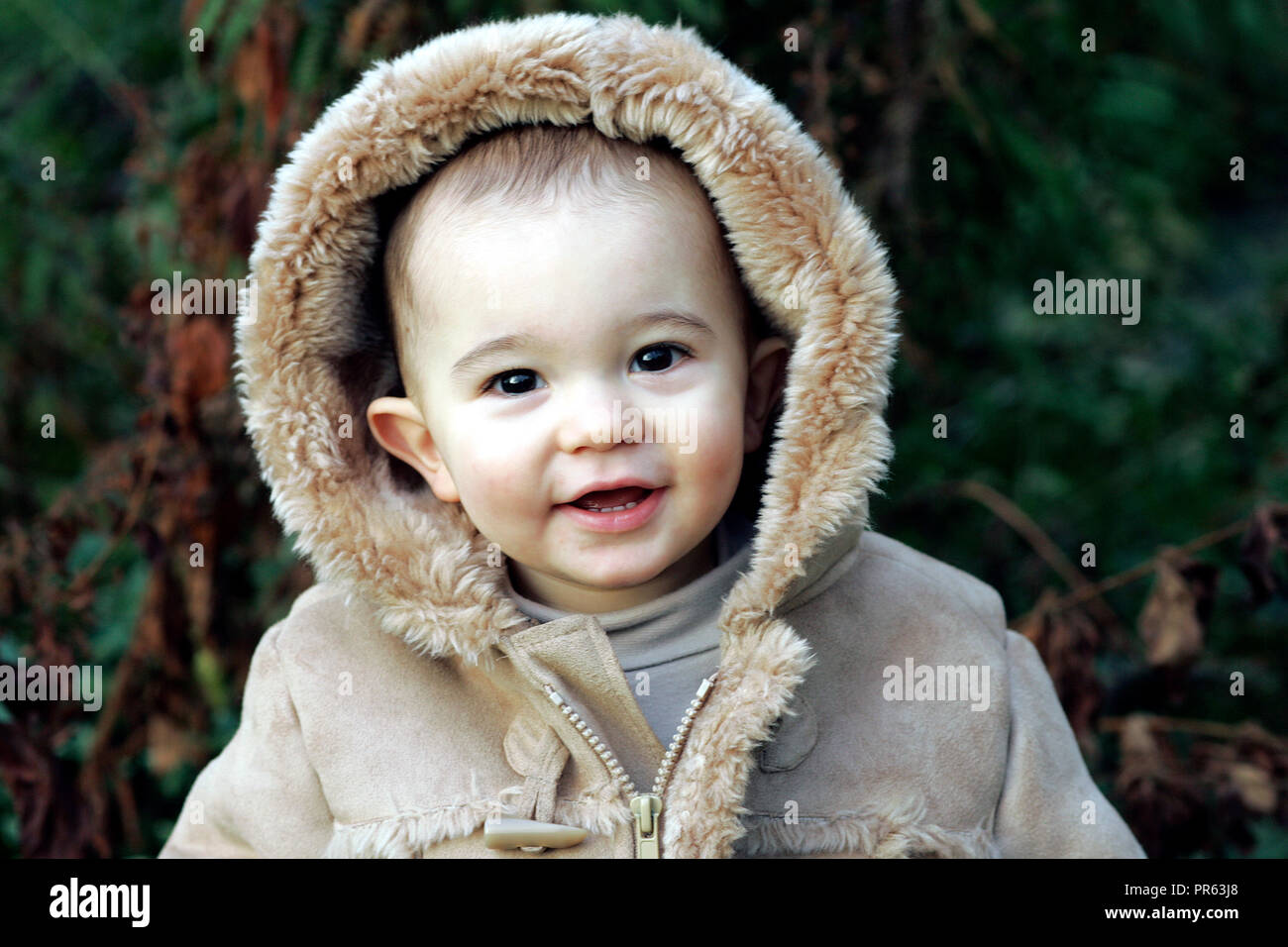 male toddler dressed for cold weather Stock Photo