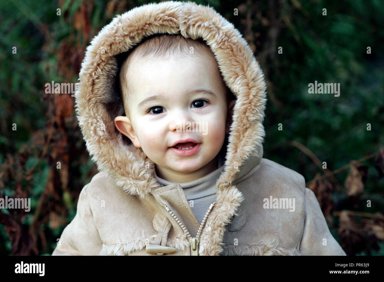 male toddler dressed for cold weather Stock Photo