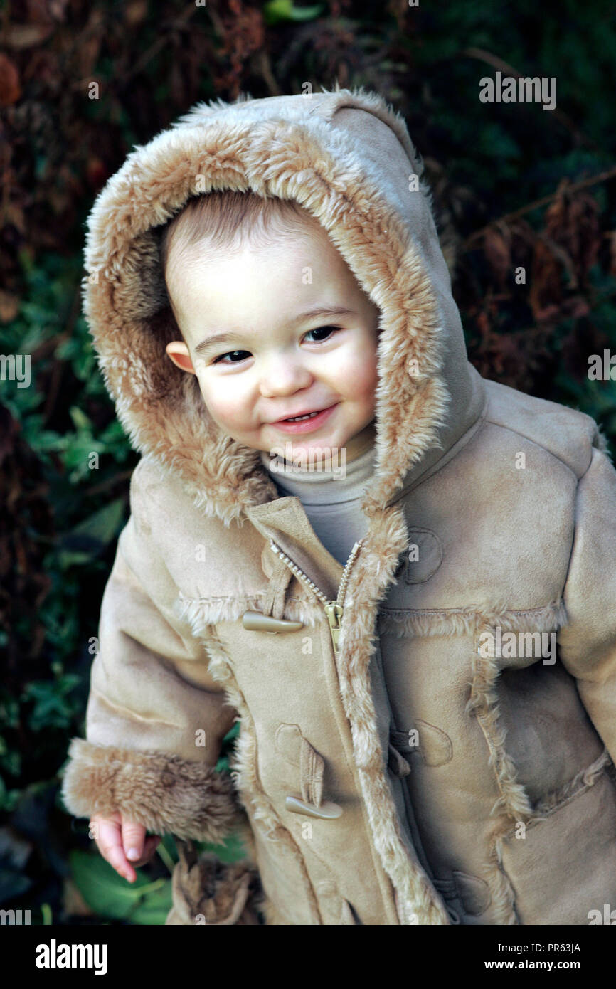 male toddler dressed for cold weather Stock Photo