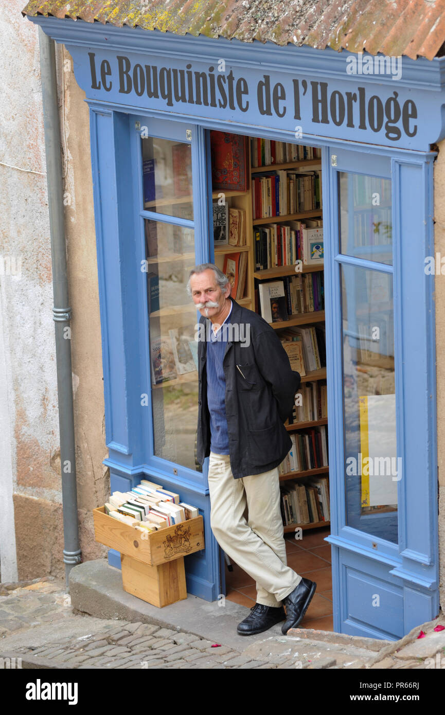 Portrait of a old books seller in Cordes sur ciel Tarn France Europe Stock Photo