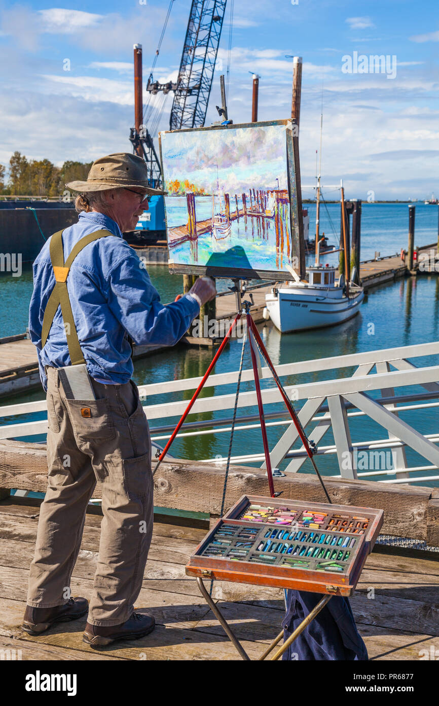 An artist participating in an Art Grand Prix in Steveston, British Columbia Stock Photo