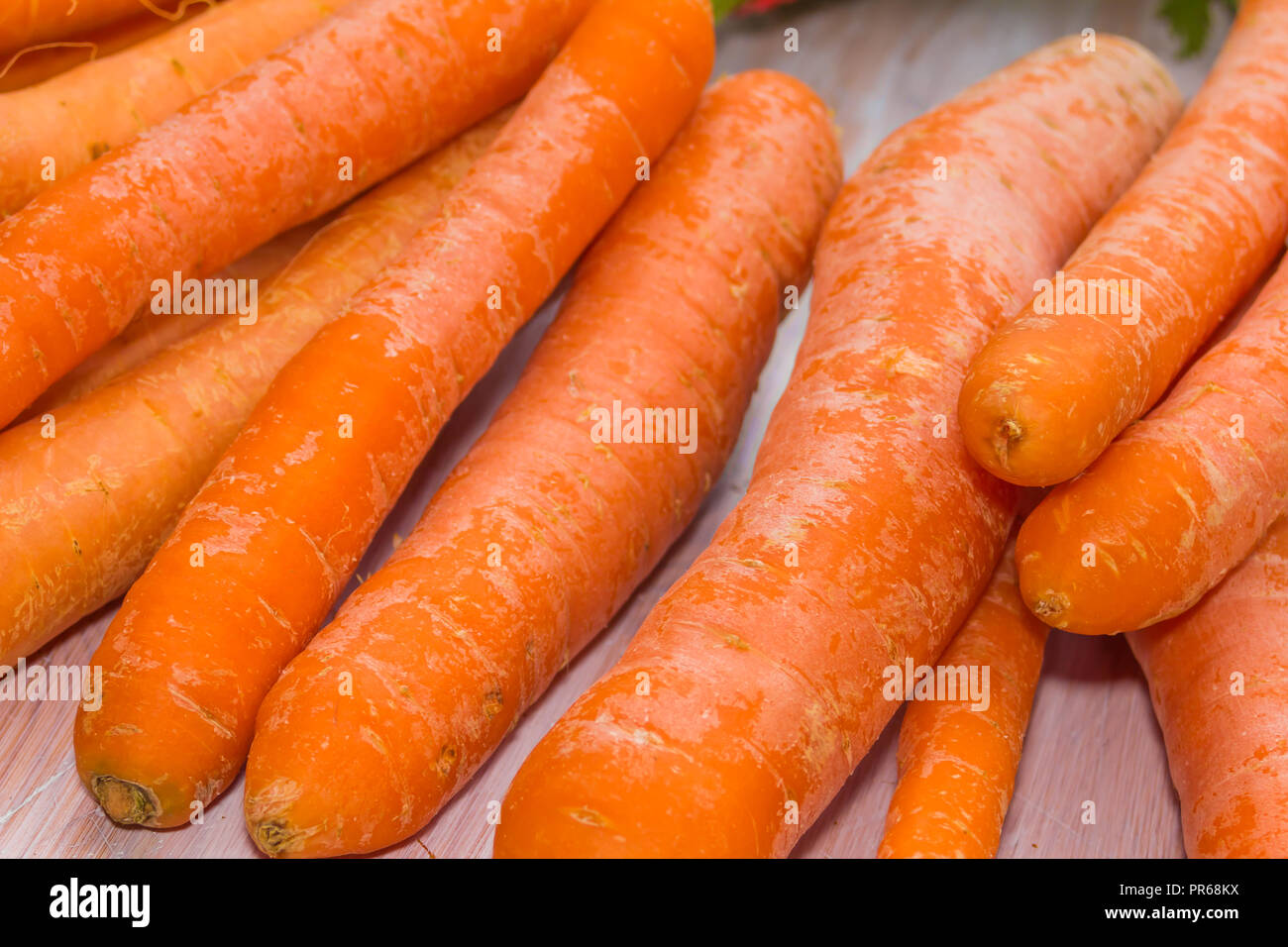 Fresh, raw, organic, bio, orange carrots. Healthy vegan vegetarian vegetable food Stock Photo