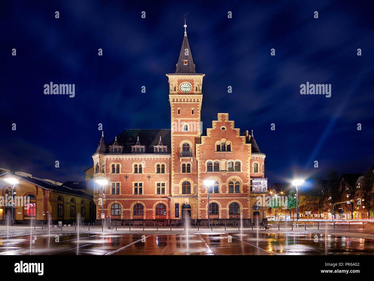 Beautiful antique building in Cologne Rheinauhafen area at night Stock Photo