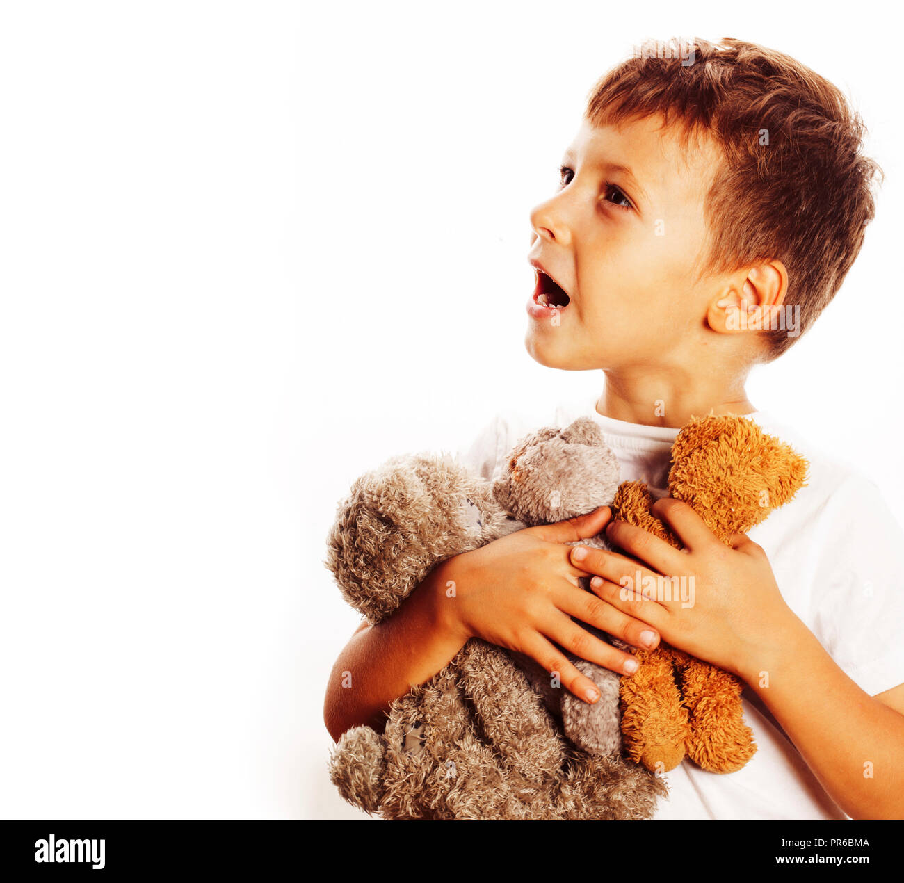 little cute boy with many teddy bears hugging isolated close up Stock ...