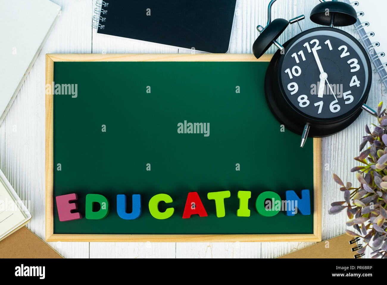 Back to school concept idea, Education text and green chalkboard with ...
