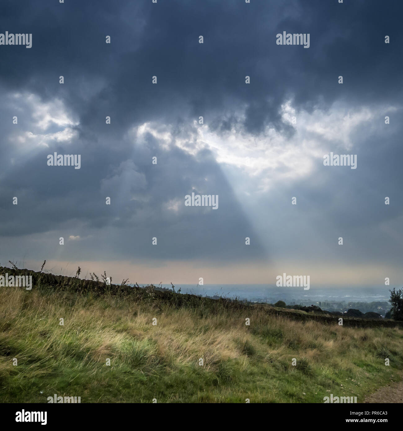 Landcape with crepuscular rays, Werneth Low, Stockport, UK Stock Photo