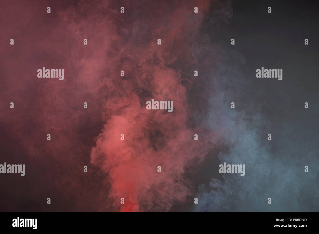 colorful purple and blue smoke on dark background Stock Photo Alamy