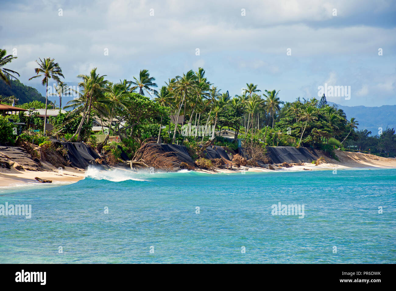 Severe beach erosion in Ehukai Beach or Banzai Pipeline, North Shore of Oahu, Hawaii, USA Stock Photo