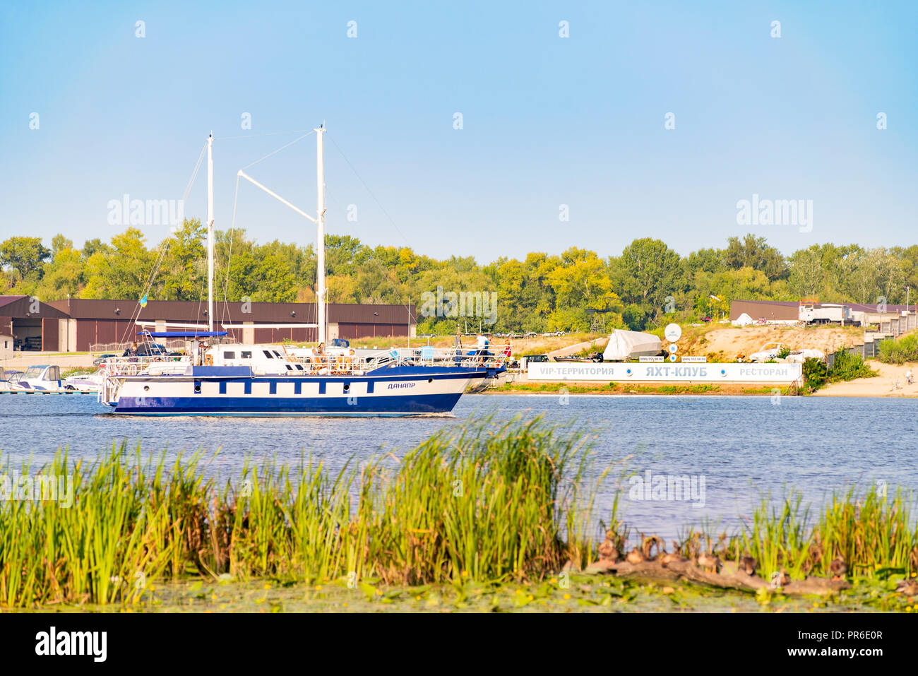 Kiev / Ukraine - August 31, 2018 - The 'Danapr' boat, navigating on the Dnieper river is ariving at the Obolon Yacht Club of Kiev, Ukraine, during a c Stock Photo