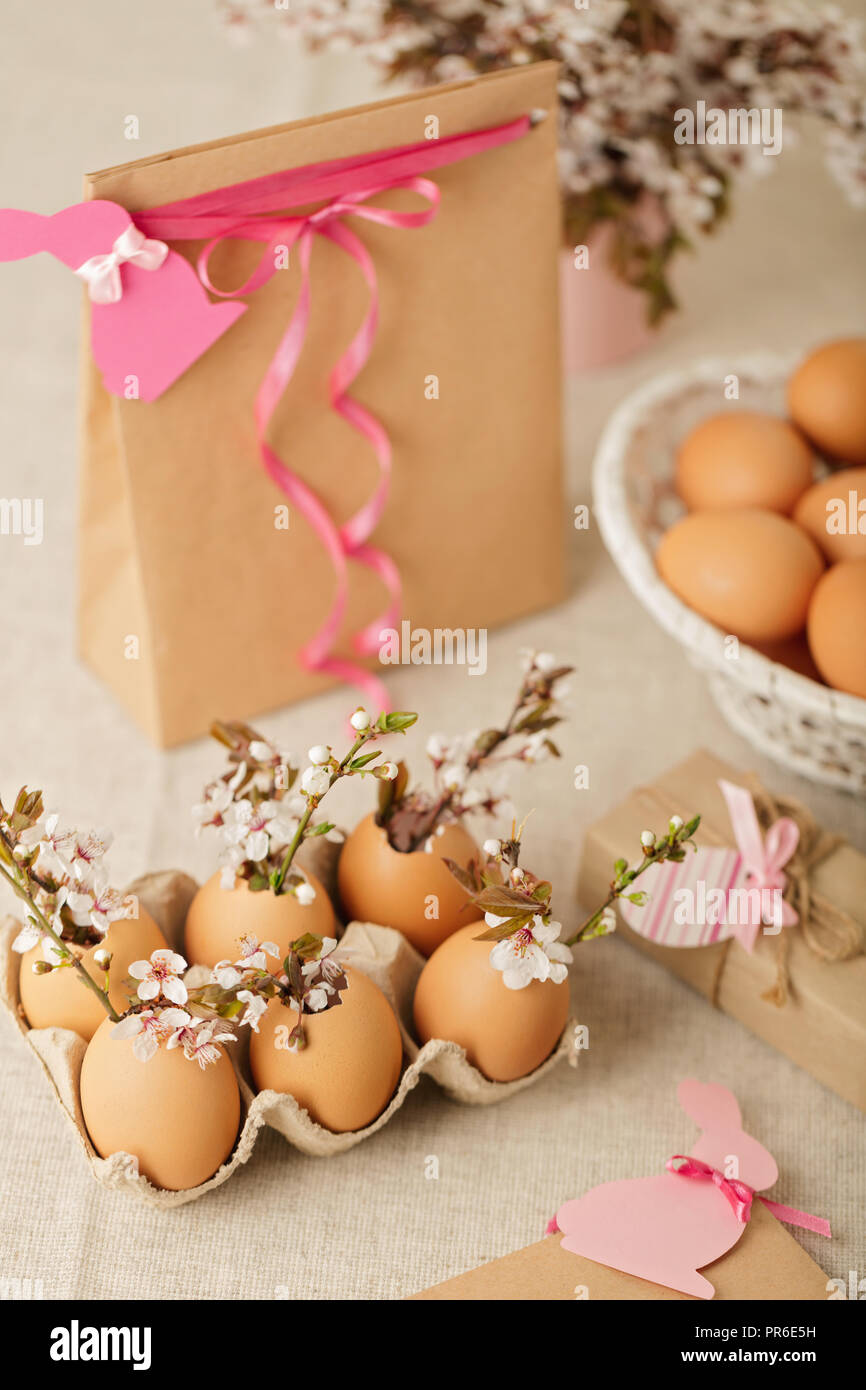 Happy easter. Easter decoration - flowering branches in the shell from the eggs. Selective focus. Stock Photo