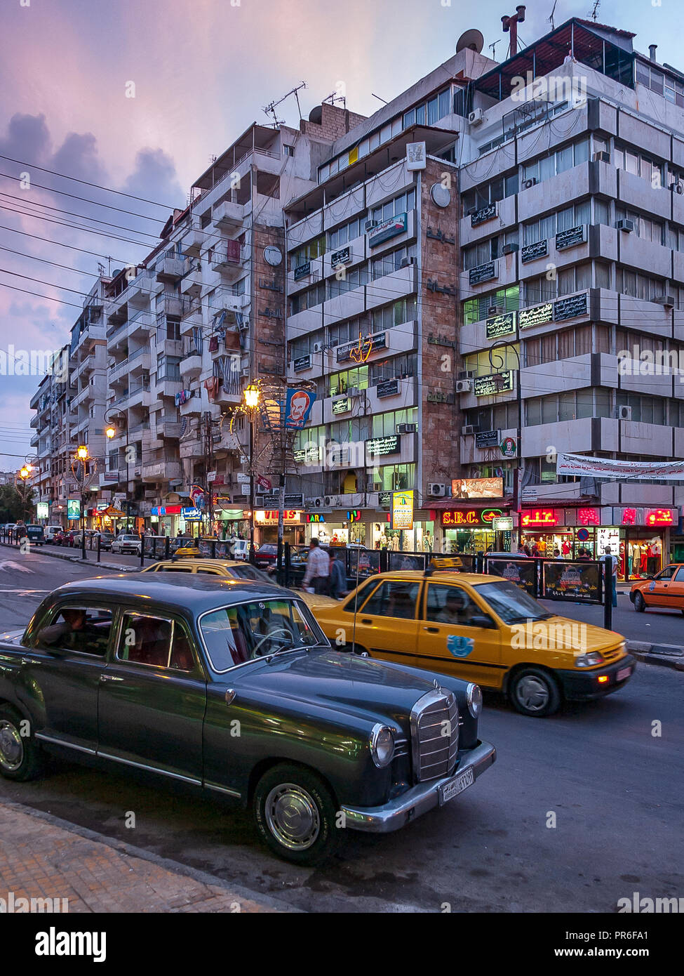 Evening lights on streets of Latakia, Syria Stock Photo Alamy