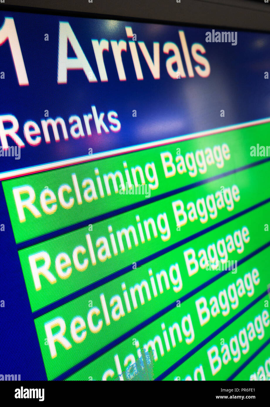 Reclaiming Baggage information sign in the Arrival Hall at Manchester
