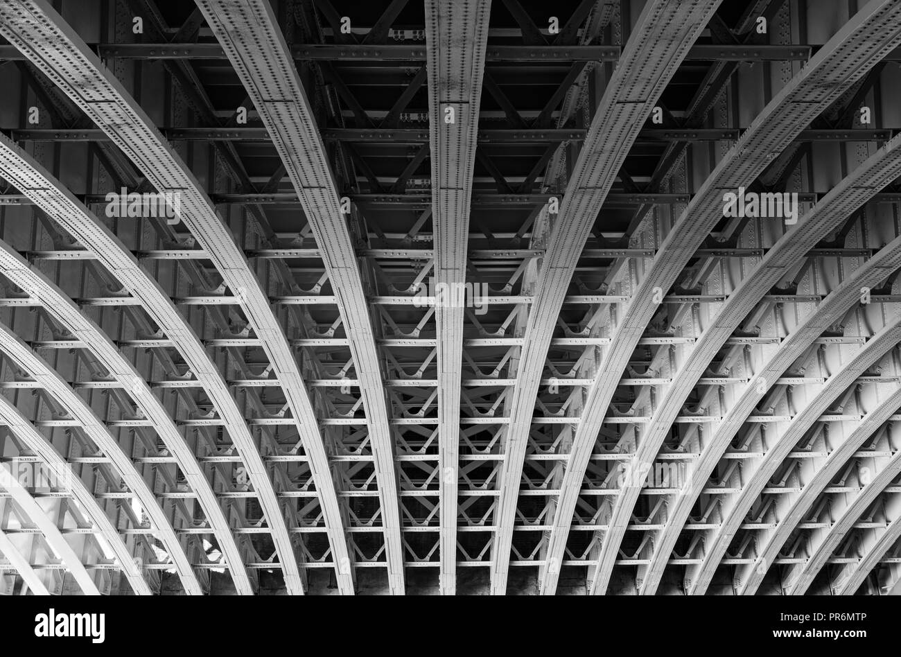 Framework under a bridge over the river Thames in London. Stock Photo