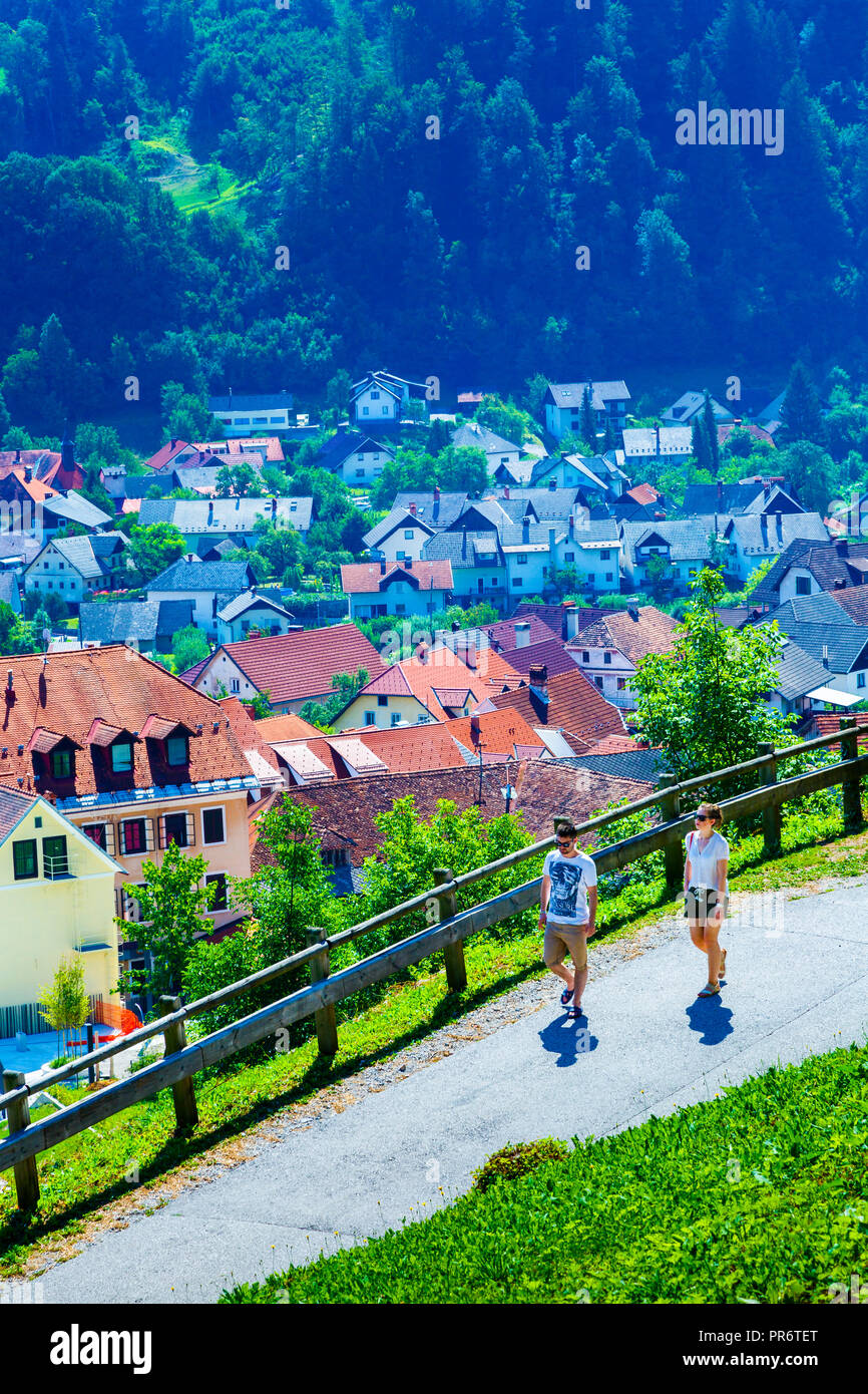 Village and tourists. Stock Photo