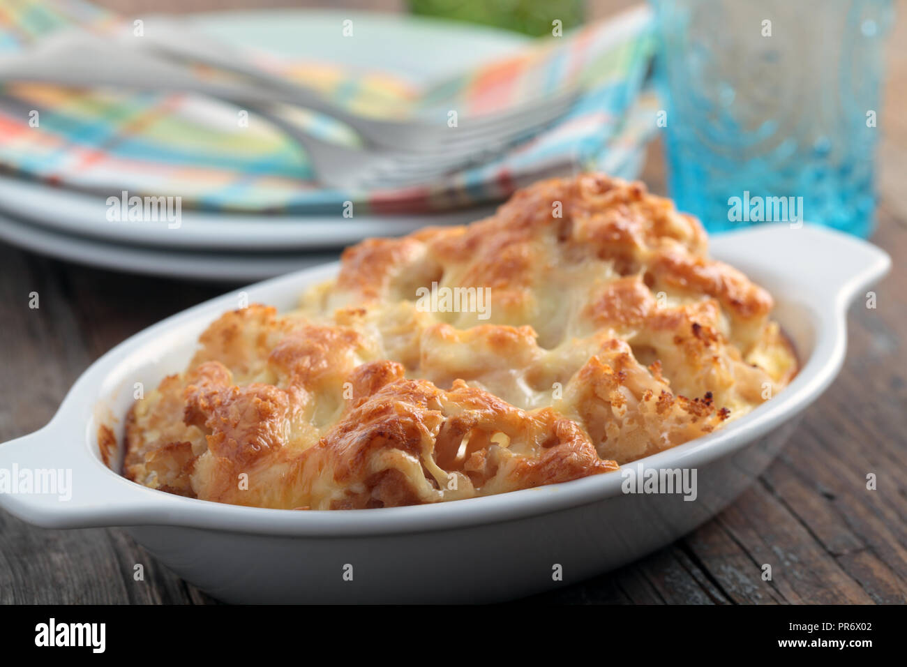 Cauliflower cheese in a baking dish Stock Photo