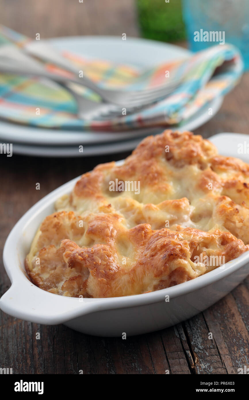 Cauliflower cheese in a baking dish Stock Photo