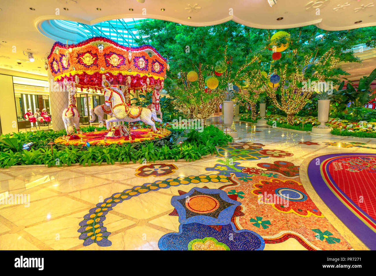 Las Vegas, Nevada, USA - August 18, 2018: animated flowers carousel in the  lobby at Wynn Hotel