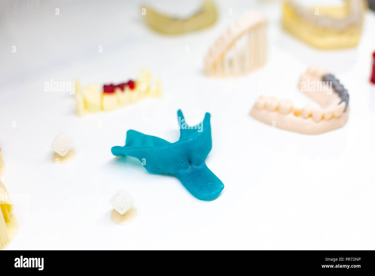 Dental orthodontic tools. Multicolored device for making a molded