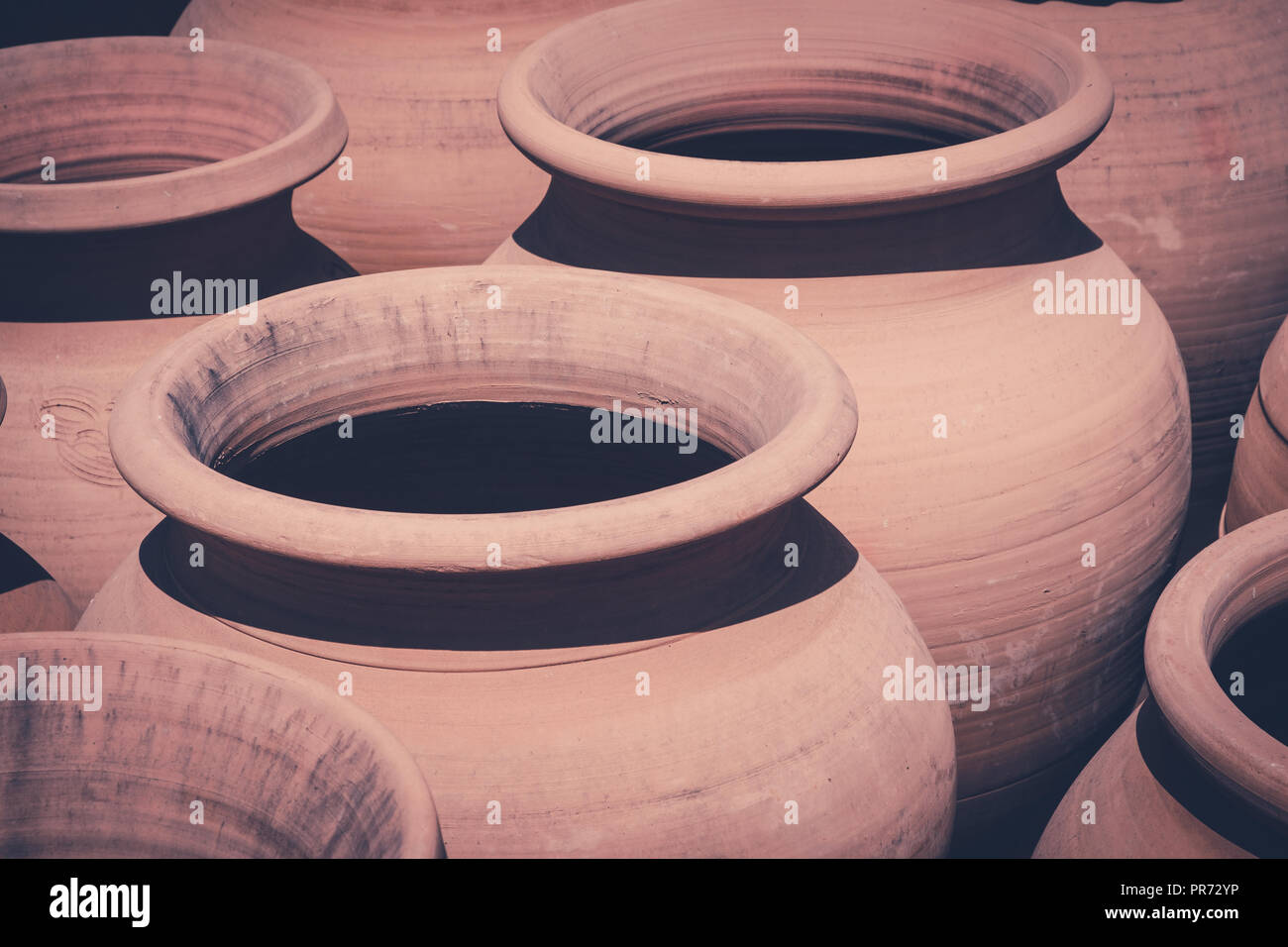 old clay pots, vintage clay pot set  - Stock Photo