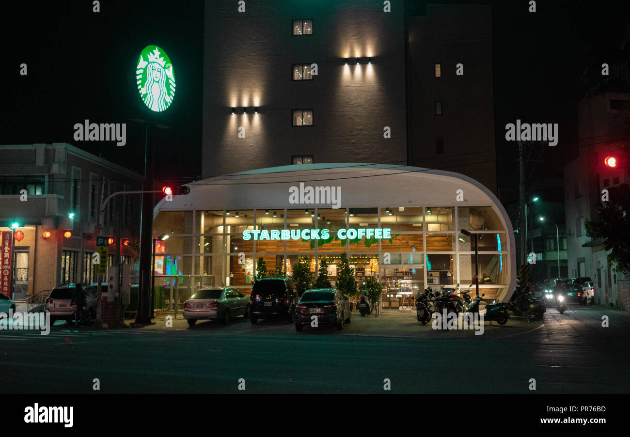 17 February 2018, Lukang Taiwan : Exterior view of a Starbucks coffee at night in Lugang Taiwan Stock Photo