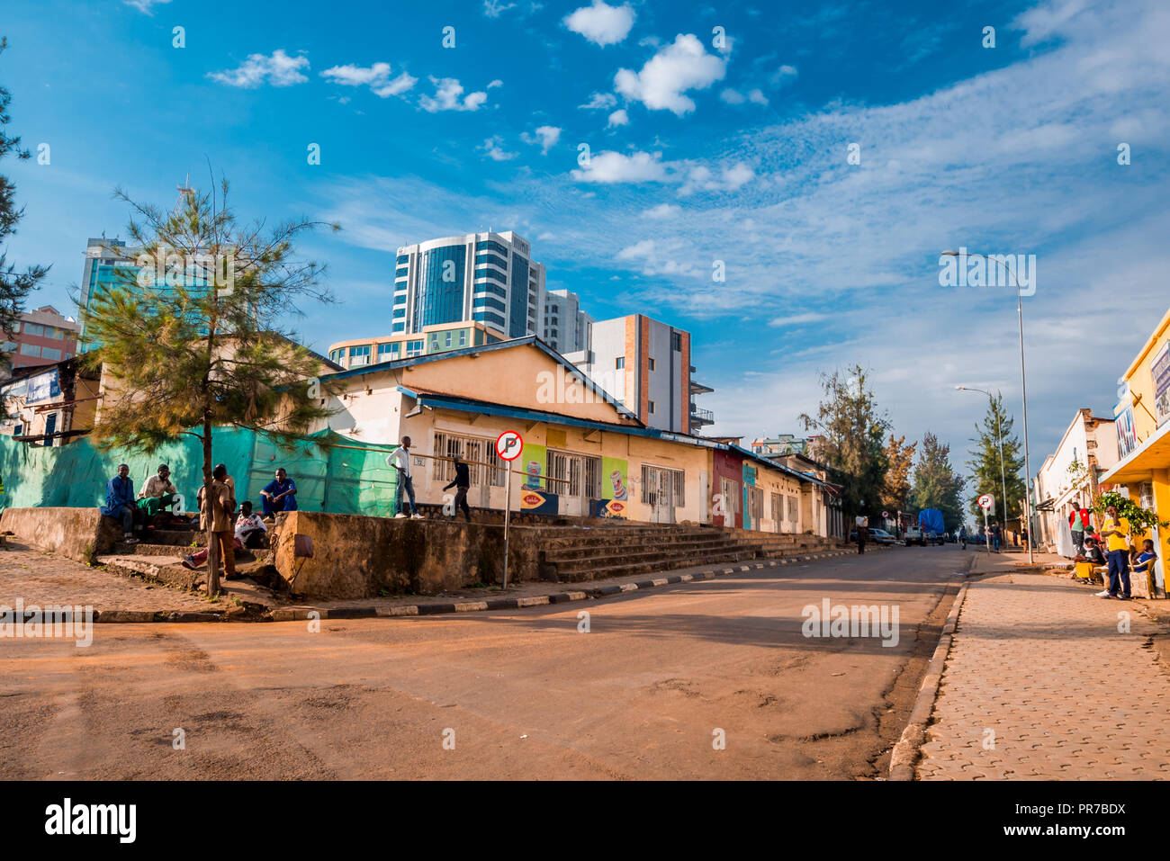 Kigali, Rwanda - September 21, 2018: A generic street scene with labourers waiting to start work Stock Photo