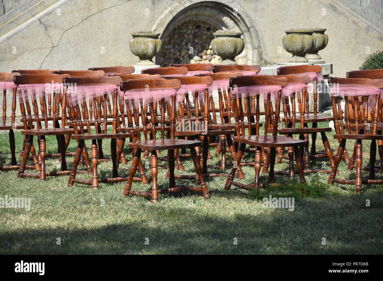 Vintage Chairs for wedding ceremony with flowers Stock Photo Alamy