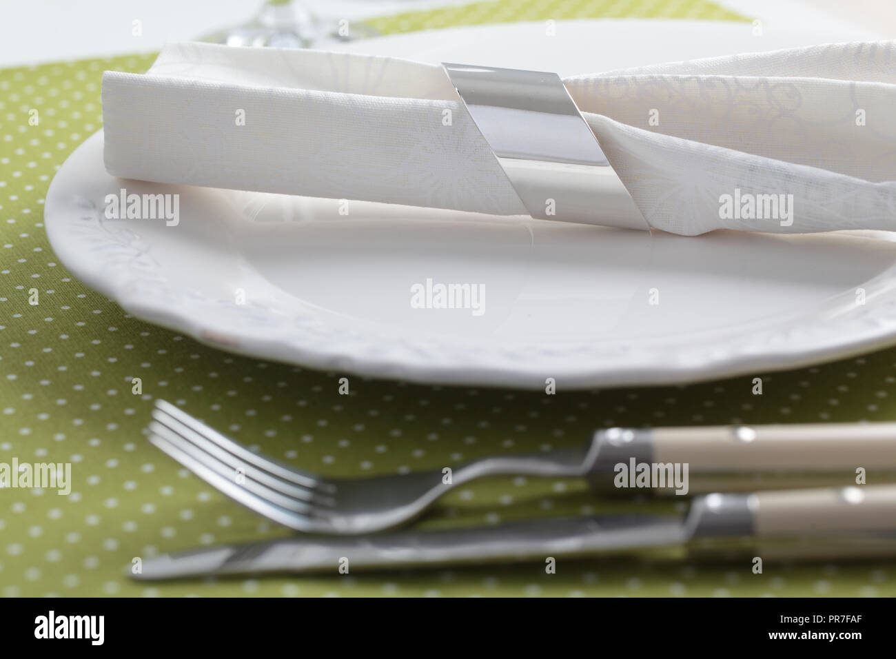 Elegant table setting with white napkin Stock Photo Alamy