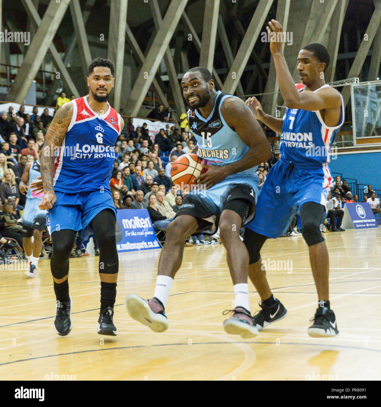 Crystal Palace, London, 29th Sep 2018. Surrey Captain Tayo Ogedengbe (15), breaks through the Royals defense.  New British Basketball League (BBL) team London City Royals win their debut home game 91:85 v Surrey Scorchers at the National Sports Centre in Crystal Palace, Southeast London. Credit: Imageplotter News and Sports/Alamy Live News Stock Photo