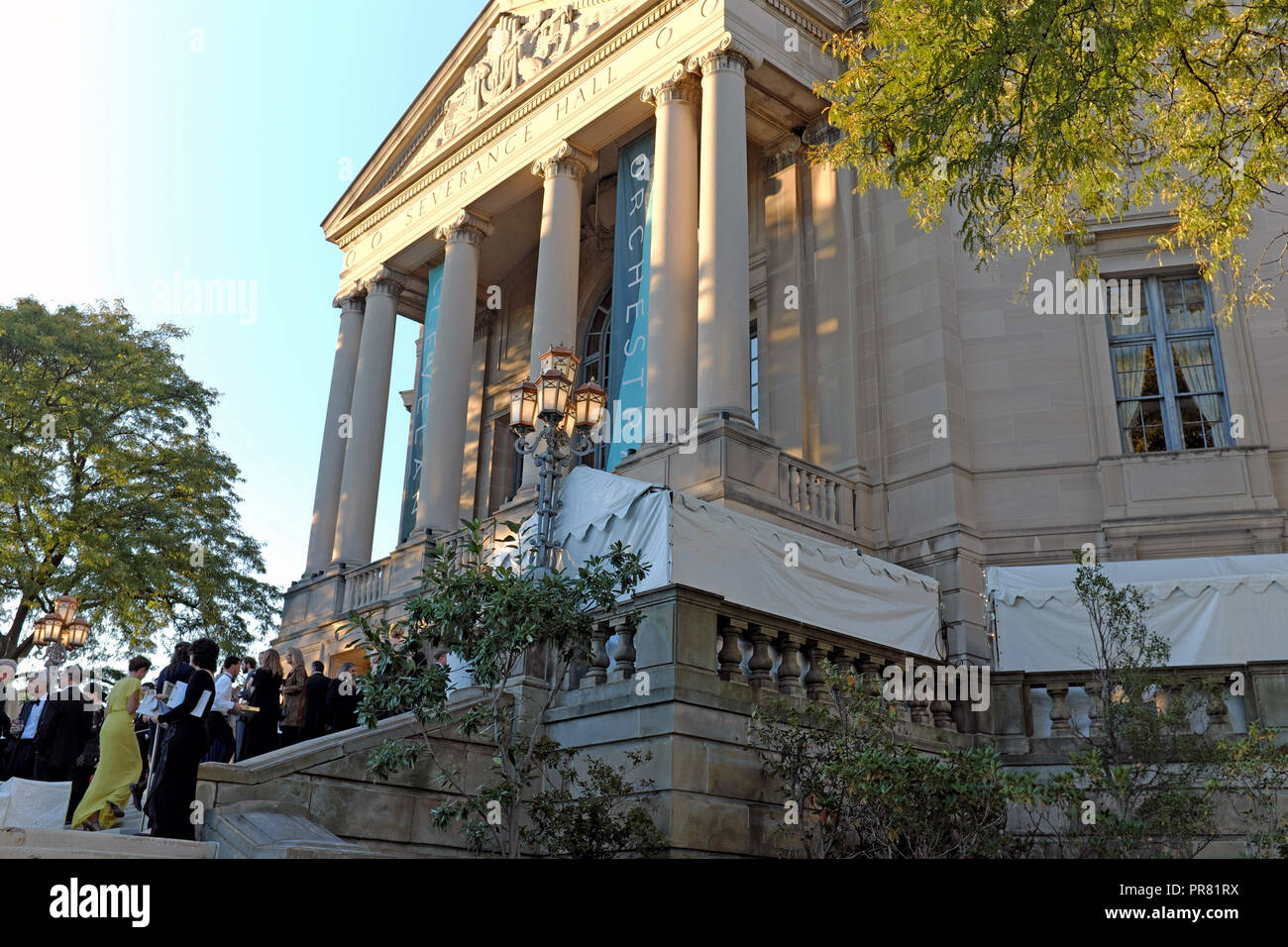 Cleveland, Ohio, USA.  29th Sept, 2018. Patrons gather on Severance Hall Front Terrace for socializing as part of the Cleveland Orchestra 100th Anniversary gala prior to the Orchestra performance.  Severance Hall is the home concert hall of the Cleveland Orchestra.  Credit: Mark Kanning/Alamy Live News. Stock Photo