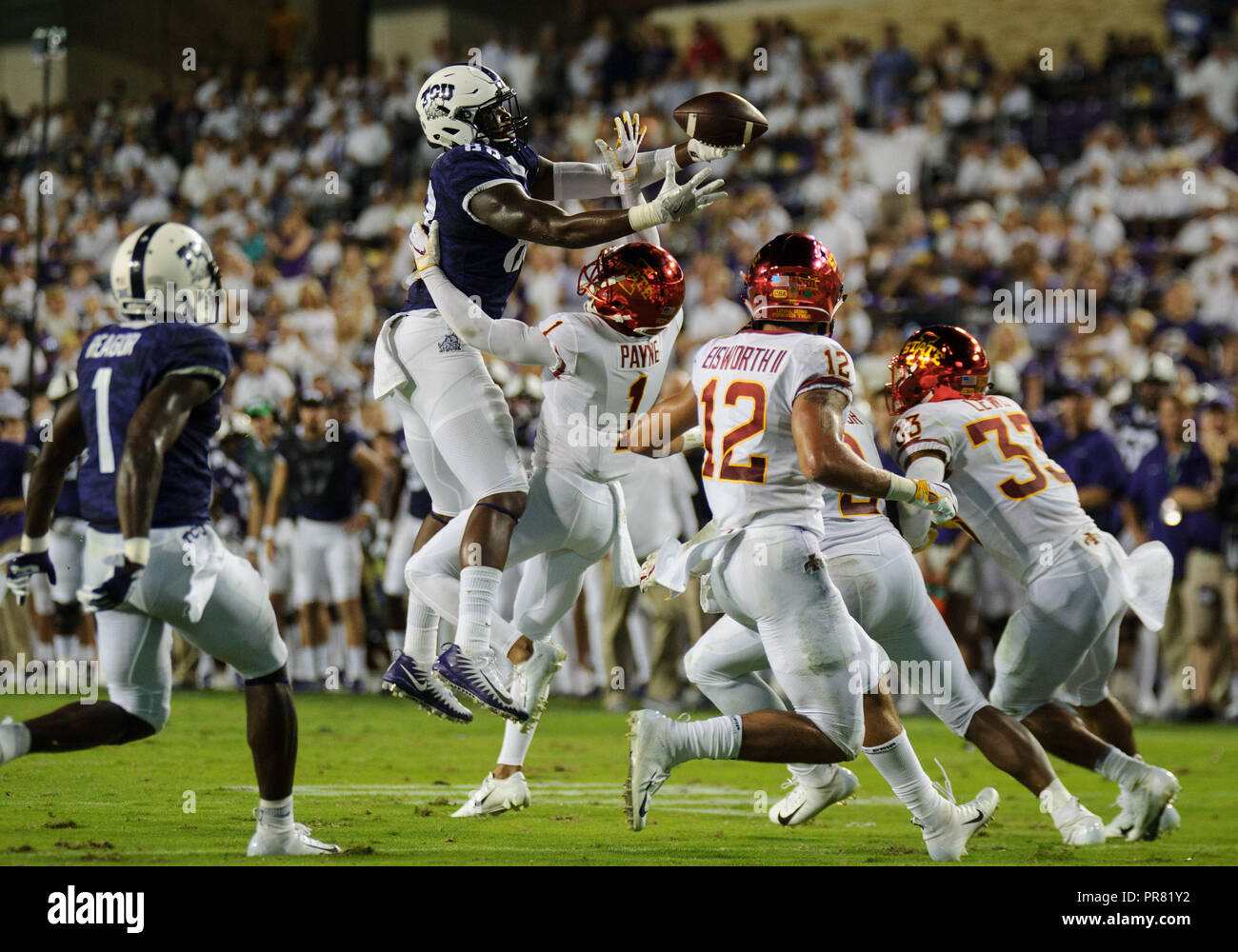 December 31, 2022 Michigan Wolverines wide receiver A.J. Henning #3 carries  the ball and is tackled by TCU Horned Frogs linebacker Dee Winters #13  during the semi-final playoff football game between the