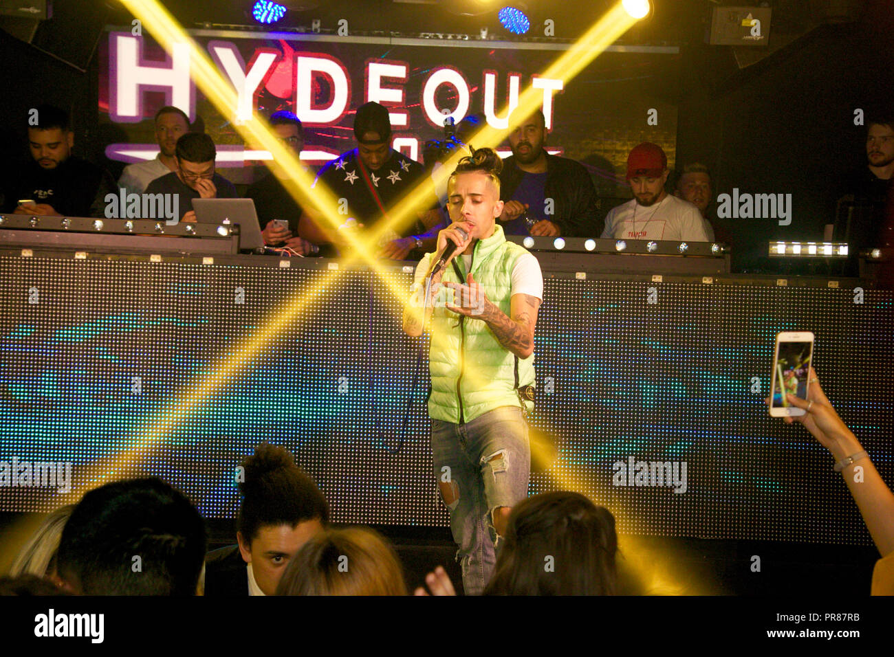 Dappy of N-Dubz performs to excited crowd at Hydeout 2.0 in Watford. He crowd surfed and sat on the shoulders of fans at the club as he performed his new single as well as classic hits from the band. He stayed for a private afterparty where girls from the crowd were hand picked to hang out backstage with Dappy and his friends who had joined him for the gig. The event was to launch the new promoter night LOCO at the club. Stock Photo