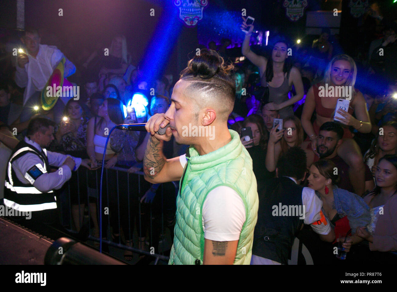 Dappy of N-Dubz performs to excited crowd at Hydeout 2.0 in Watford. He crowd surfed and sat on the shoulders of fans at the club as he performed his new single as well as classic hits from the band. He stayed for a private afterparty where girls from the crowd were hand picked to hang out backstage with Dappy and his friends who had joined him for the gig. The event was to launch the new promoter night LOCO at the club. Stock Photo